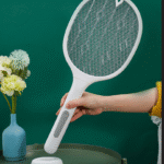 User holding lightweight mosquito swatter racket