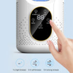 Portable cooling humidifier fan on desk