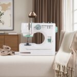 Household sewing machine showing reverse stitch function for reinforcement